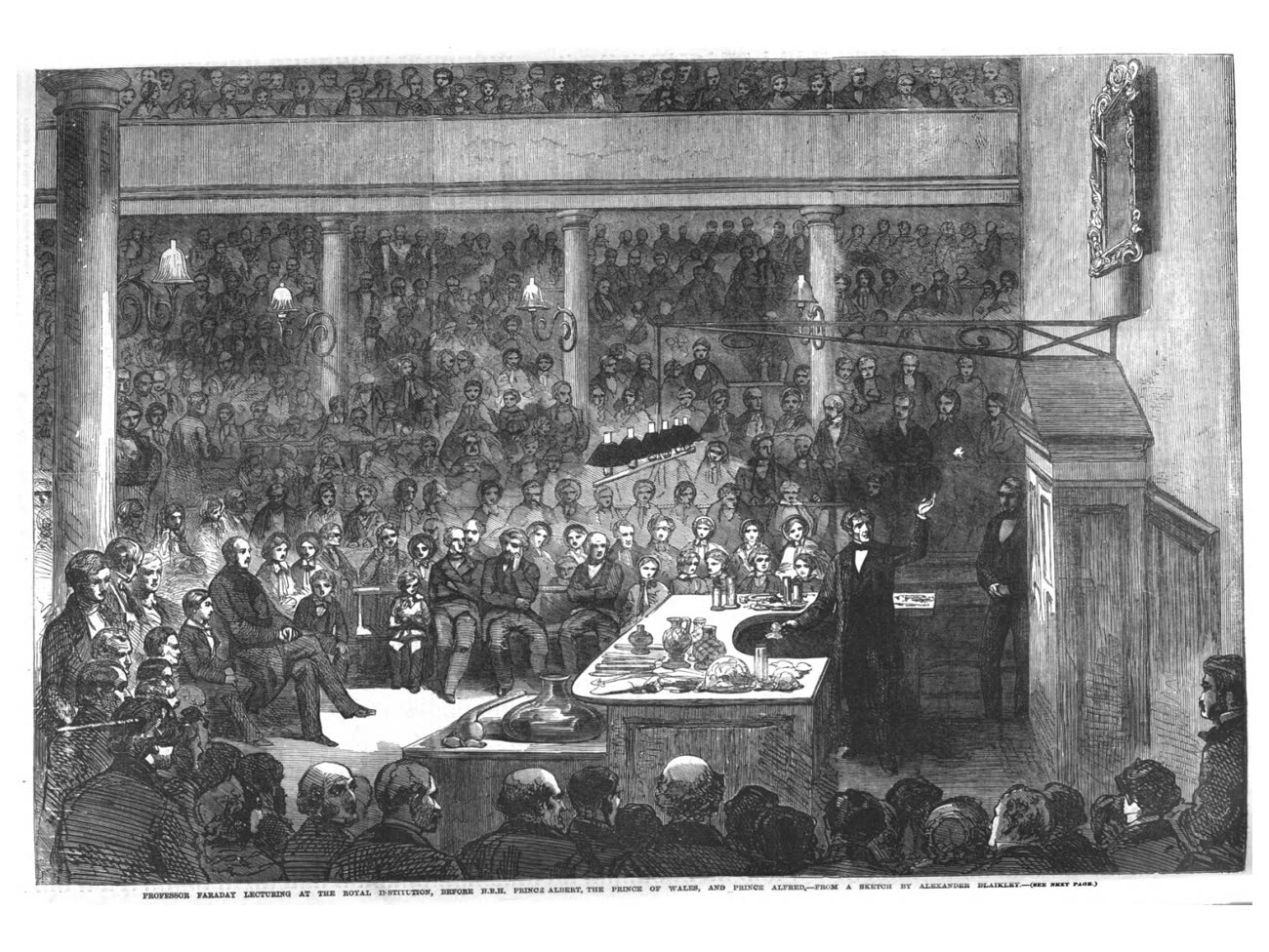 Painting of Faraday lecturing to a packed audience at the Royal Institution, with Prince Albert in the front row.