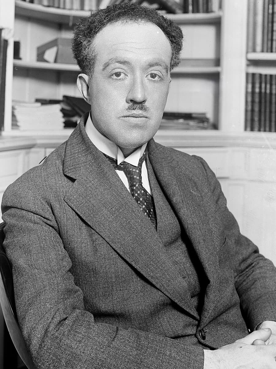Louis de Broglie as a young man in formal dress.