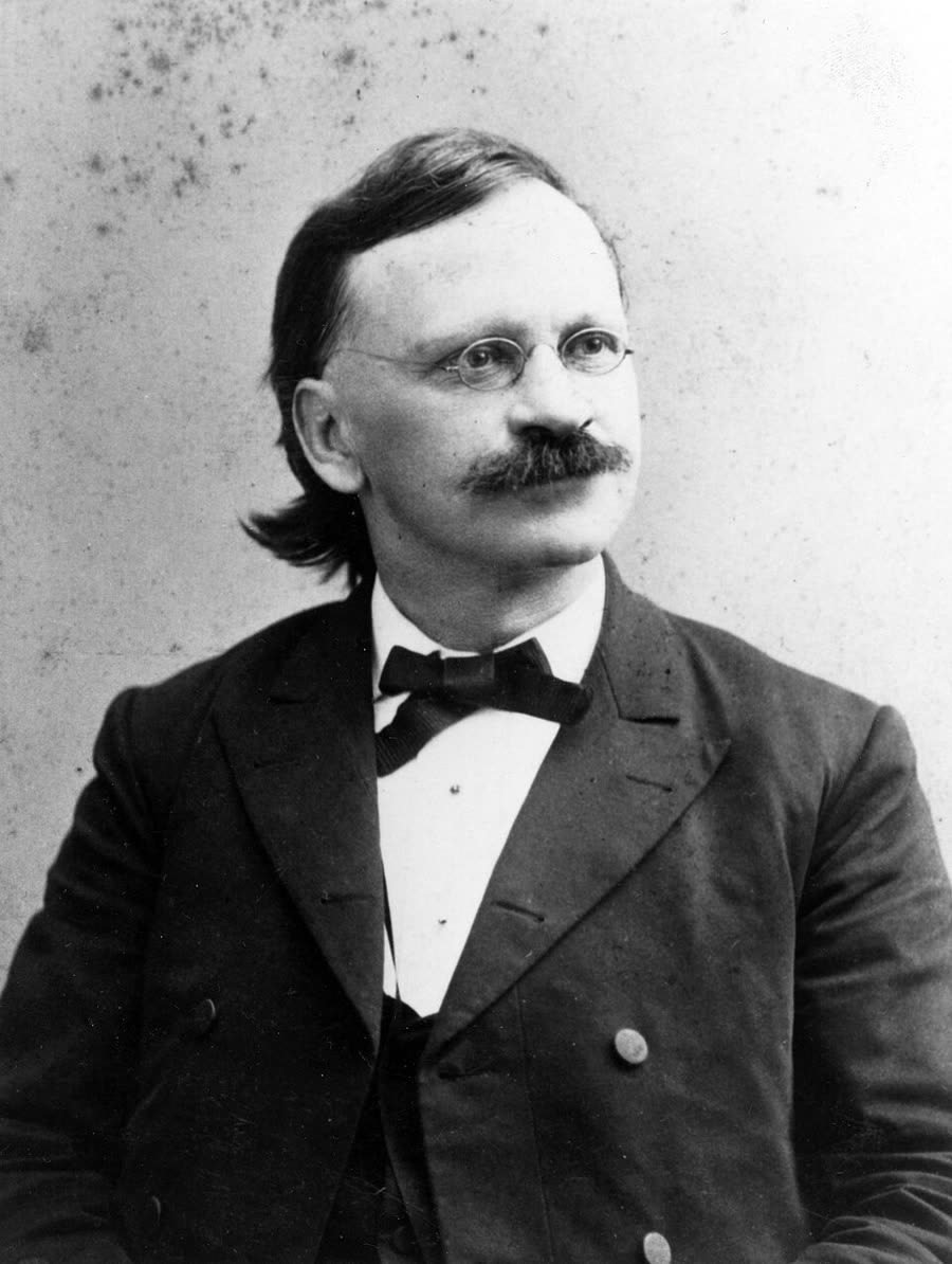 Portrait of Edward W. Morley with a full beard, photographed around 1885.